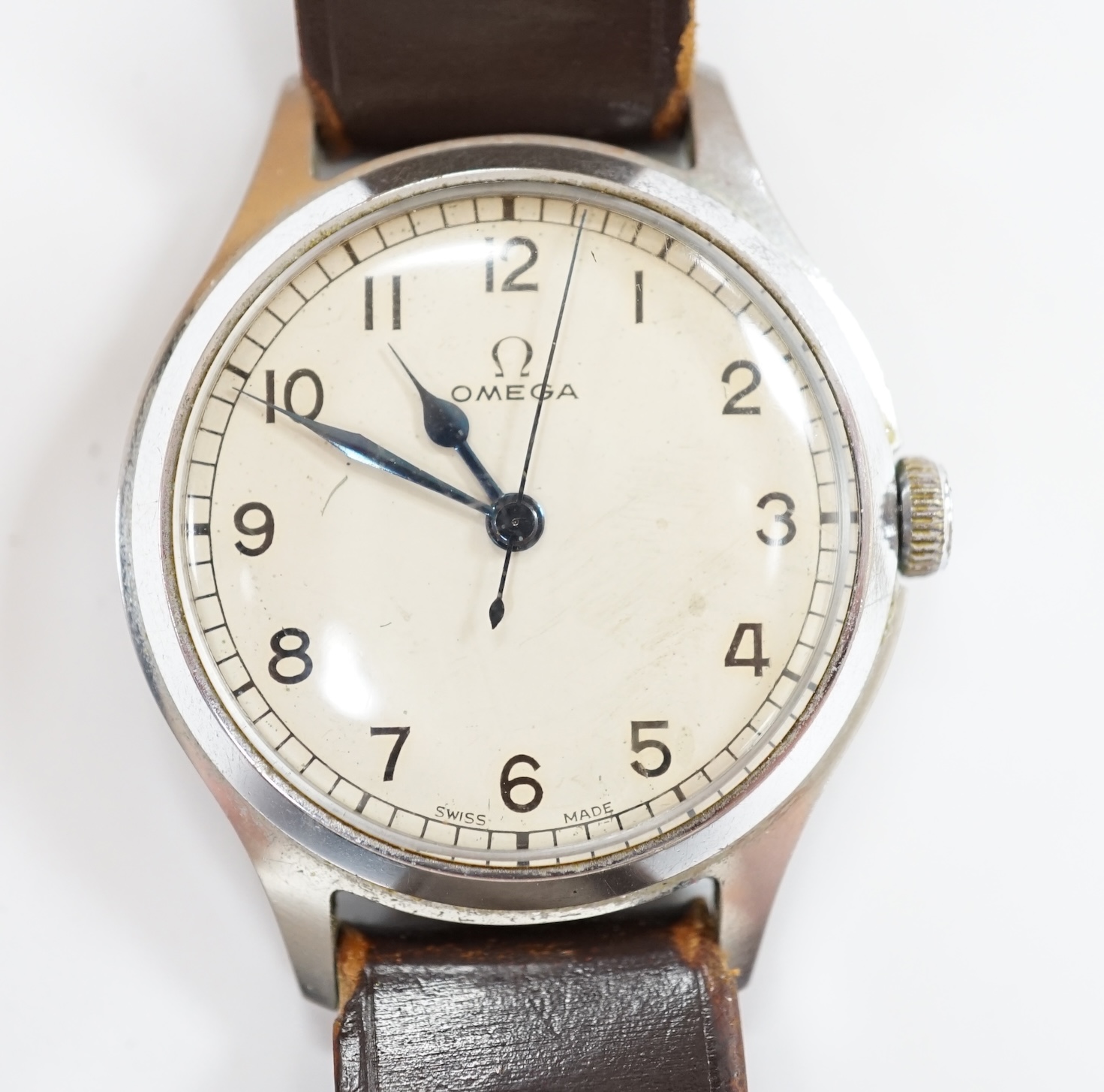 A gentleman's early 1940's stainless steel Omega manual wind wrist watch, with Arabic dial, movement c.30 T2, case diameter 35mm, on a later associated leather strap. Condition - poor to fair